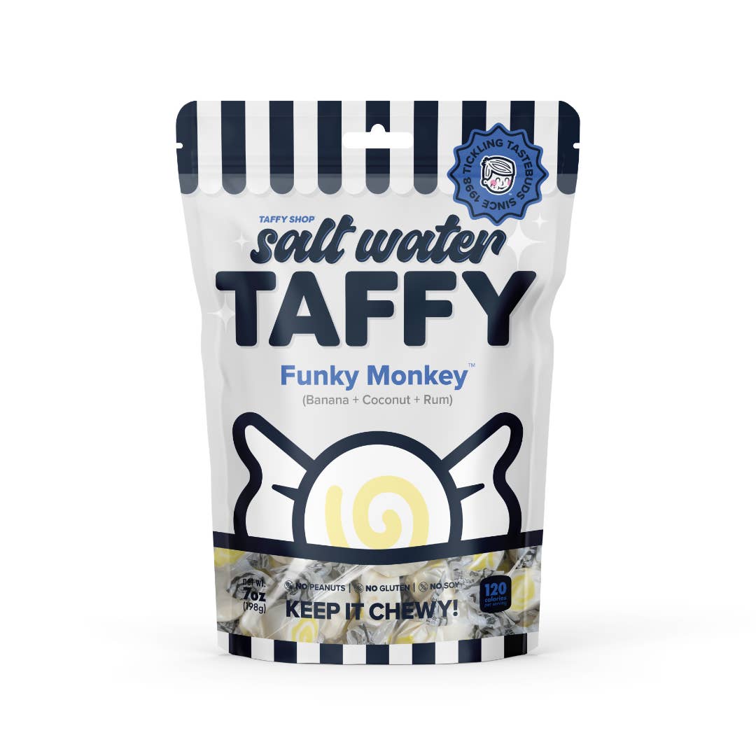Funky Monkey™ is the taffy that goes a little bananas! A playful blend of sweet banana, creamy coconut, and a hint of rum, this treat is as fun and funky as it sounds. One chewy bite and you’ll be swinging through flavor like a monkey on a tropical adventure! Taffy Shop's Funky Monkey™ salt water taffy is guaranteed fresh. Made with love in the USA.