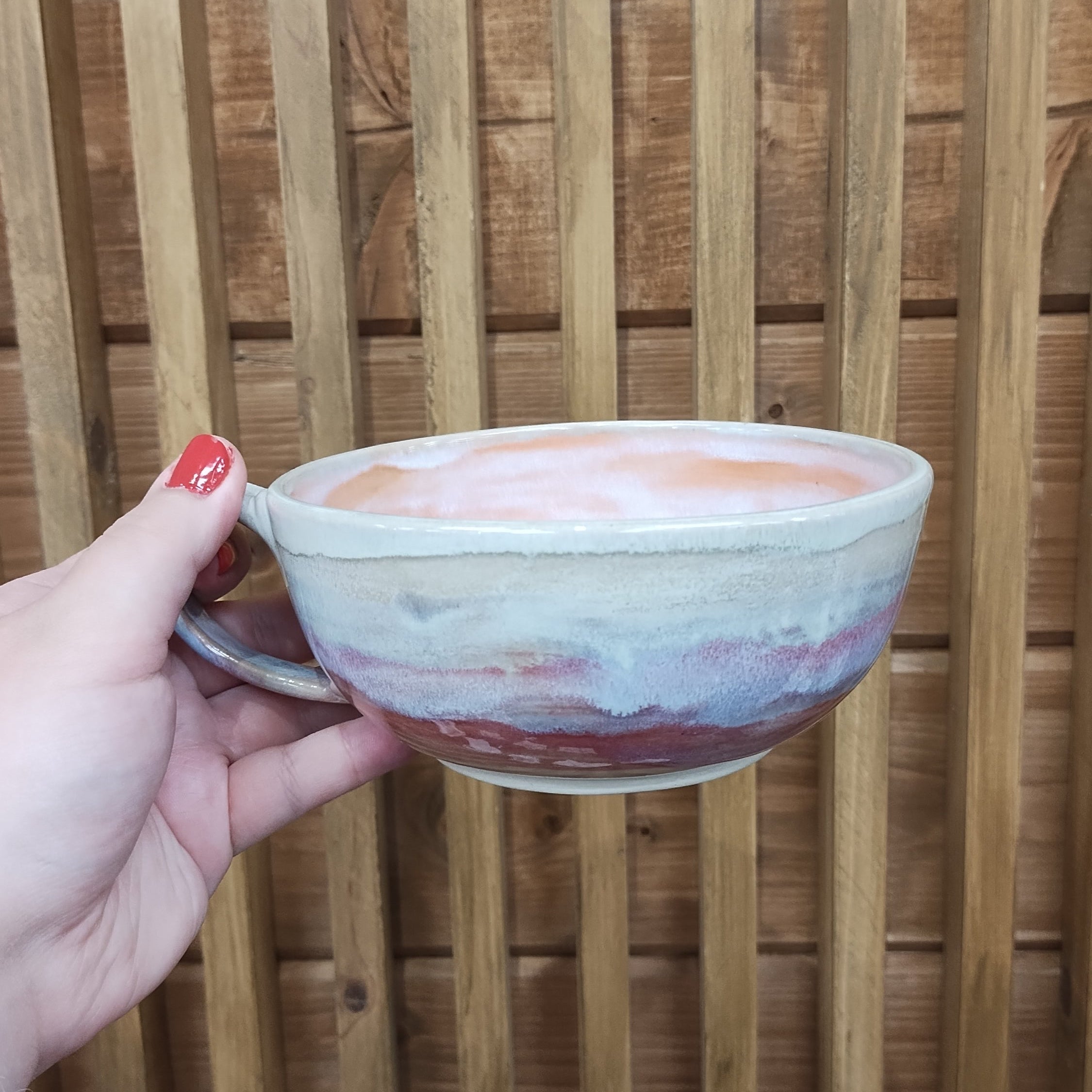 Multi color glazed wide cappuccino mug.