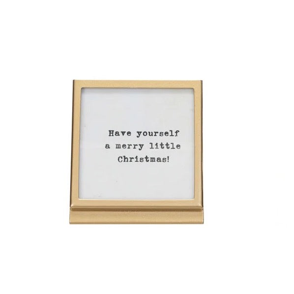 Framed text 'Have yourself a merry little Christmas!' on a white background