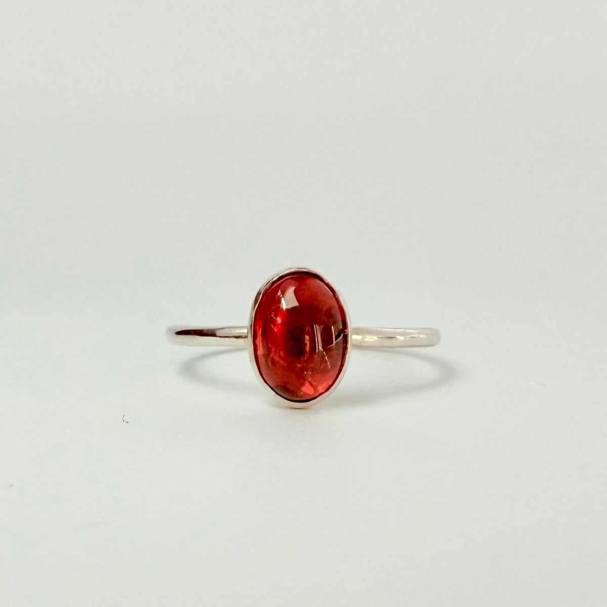 RED GARNET OVAL GEMSTONE RING IN SILVER