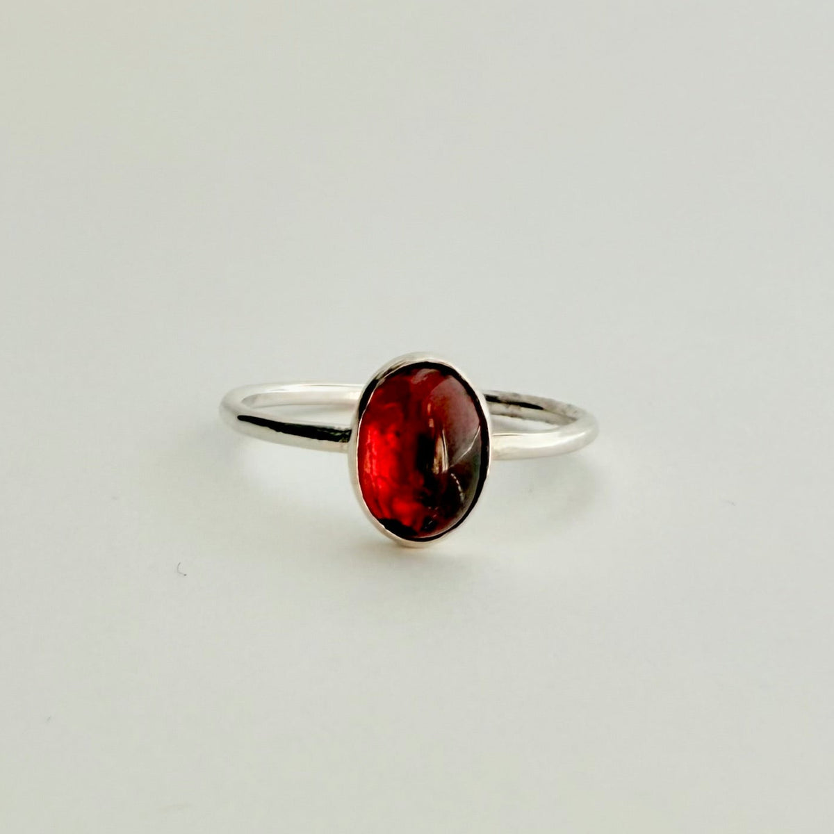 RED GARNET OVAL GEMSTONE RING IN SILVER