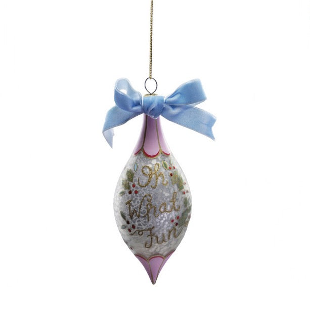 Decorative ornament with a blue bow and text on a white background