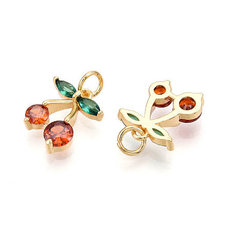 This gold-plated cherry cluster charm brings a playful and vibrant touch to your charm bracelet or necklace. Crafted with care, its delicate design captures the sweet charm of ripe cherries, making it an ideal piece to celebrate joyful moments or add a pop of color to your collection. Lightweight and versatile, it’s a lovely way to express your style or share a meaningful gift.
Details:
Rack Plating Brass Pendants, Long-Lasting Real 18K Gold Plated, Cadmium Free & Lead Free
Size: 14x11.5x3mm, hole:3.5mm
