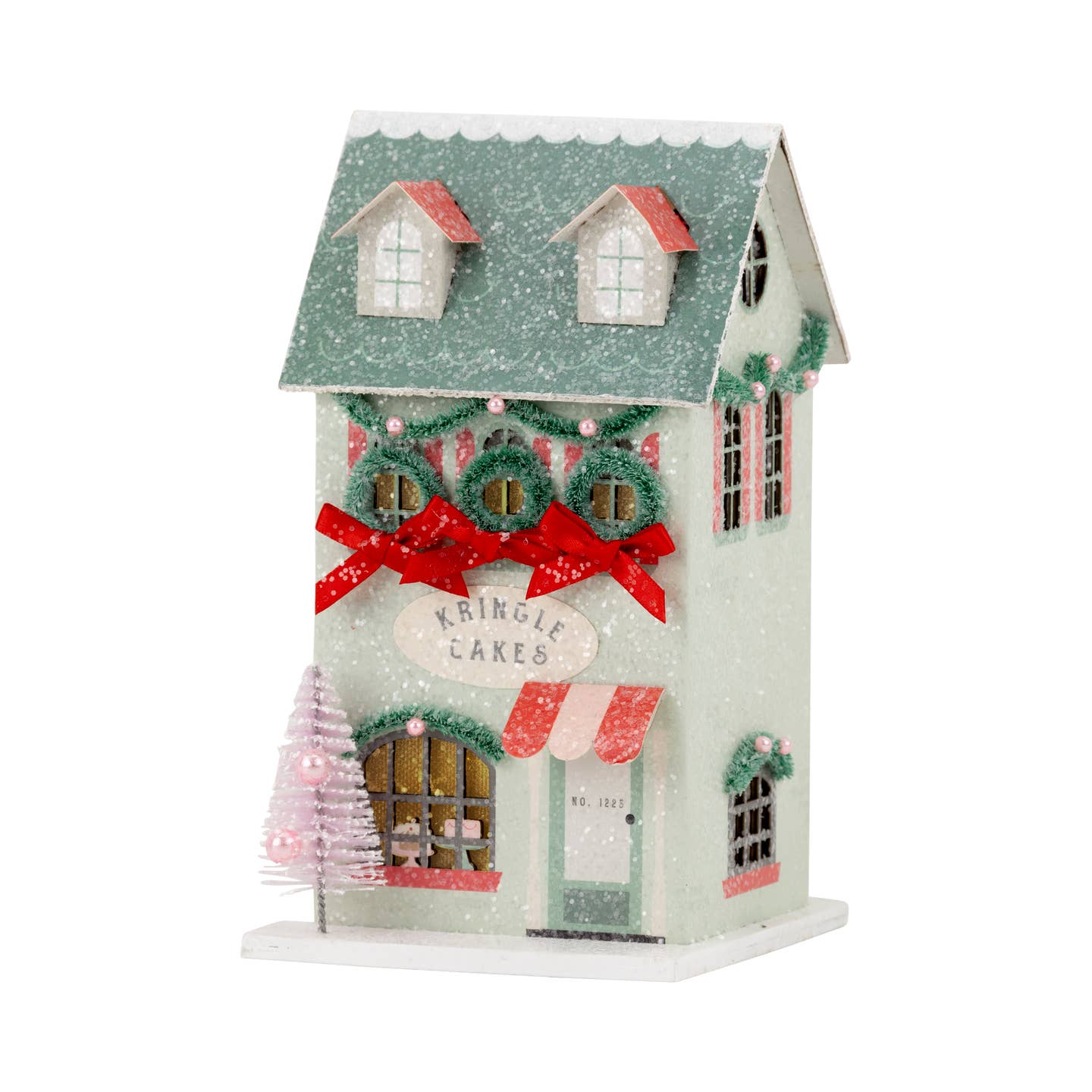 Get ready for the sweetest holiday treat with our Christmas Village Cake Shoppe. Add some festive cheer to your decor with this heavyweight paper house village. Perfect for a charming addition to your Christmas village collection. Happy Holidays!
Details:
House is 4" wide x 3.5" deep x 6" tall
Constructed of heavyweight paperboard with glitter accents
includes battery powered light inside (please keep out of reach of small children)
BATTERIES NOT INCLUDED