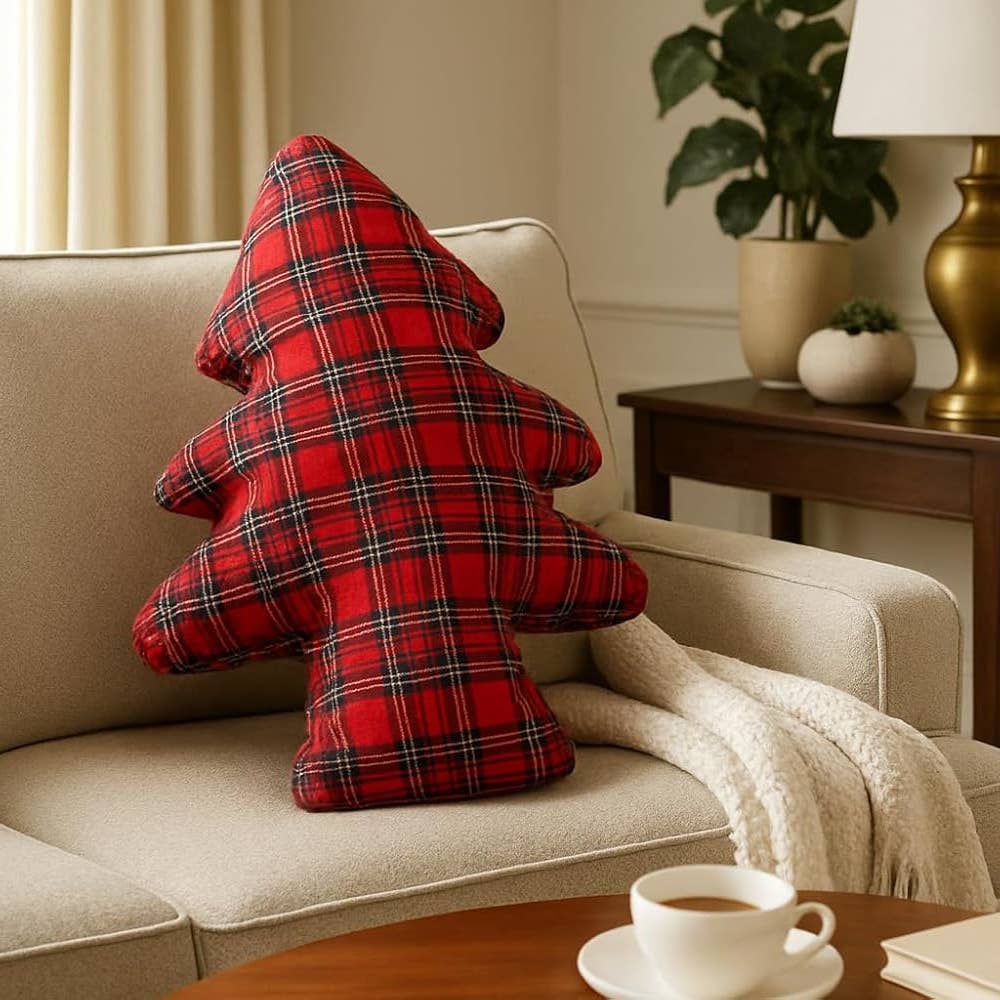 Bring festive cheer to your home with this charming tartan plaid Christmas tree pillow. Featuring a classic red plaid pattern, this uniquely shaped accent piece celebrates the holiday season with warmth and style. Perfect for adding a cozy touch to your sofa, armchair, or bed, it's an easy way to embrace seasonal décor without overwhelming your space. Whether you're decorating early or looking for that final festive detail, this pillow brings timeless holiday spirit to any room.
Details:
Size: 18"W x 24"L