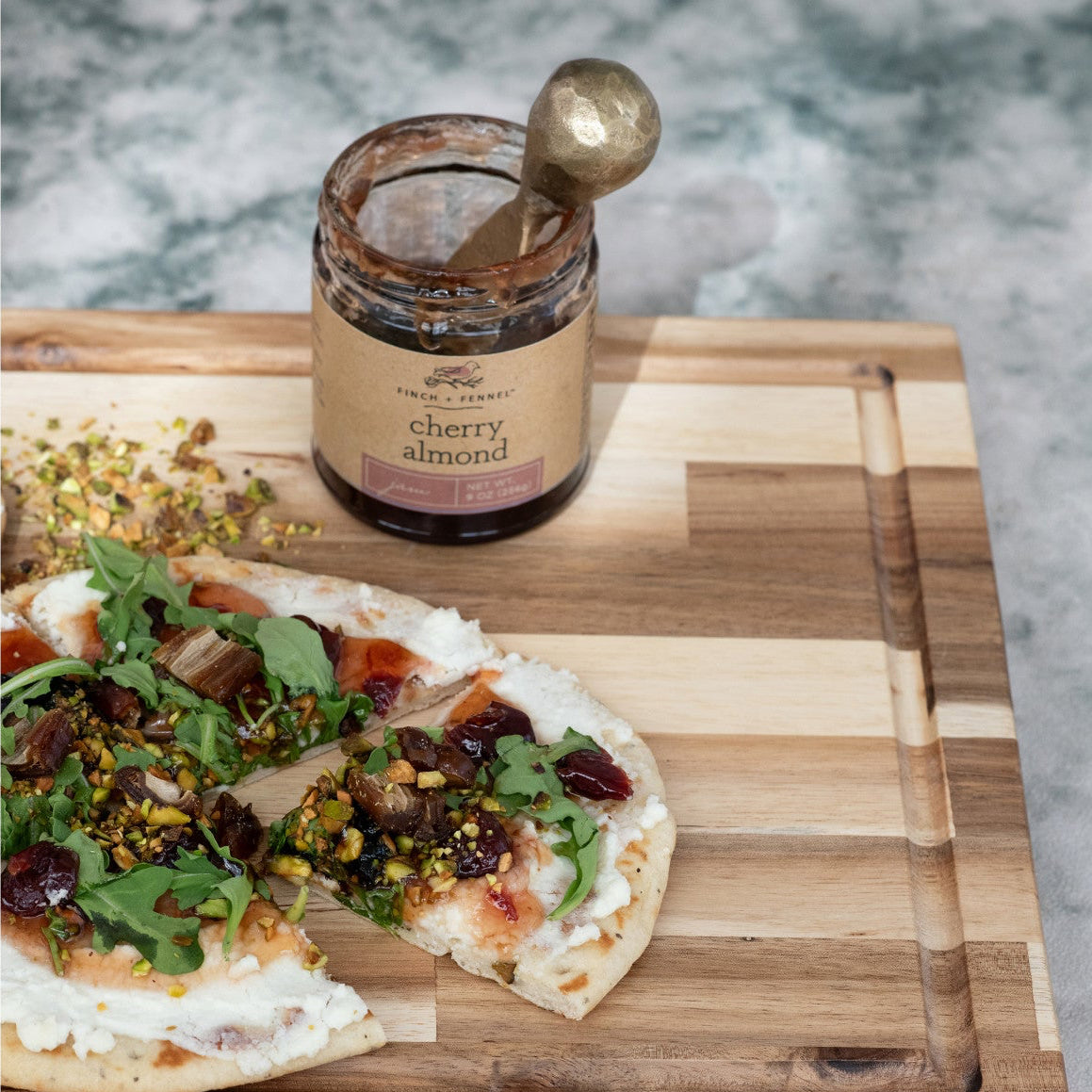 I in the delightful combination of sweet cherries and nutty almond essence with our 9 oz. Cherry Almond Jam. Made with ripe, juicy cherries and a hint of fine almond flavor, this jam is perfect for spreading on toast, scones, or pairing with cheese for a gourmet treat. A classic flavor elevated for your enjoyment.