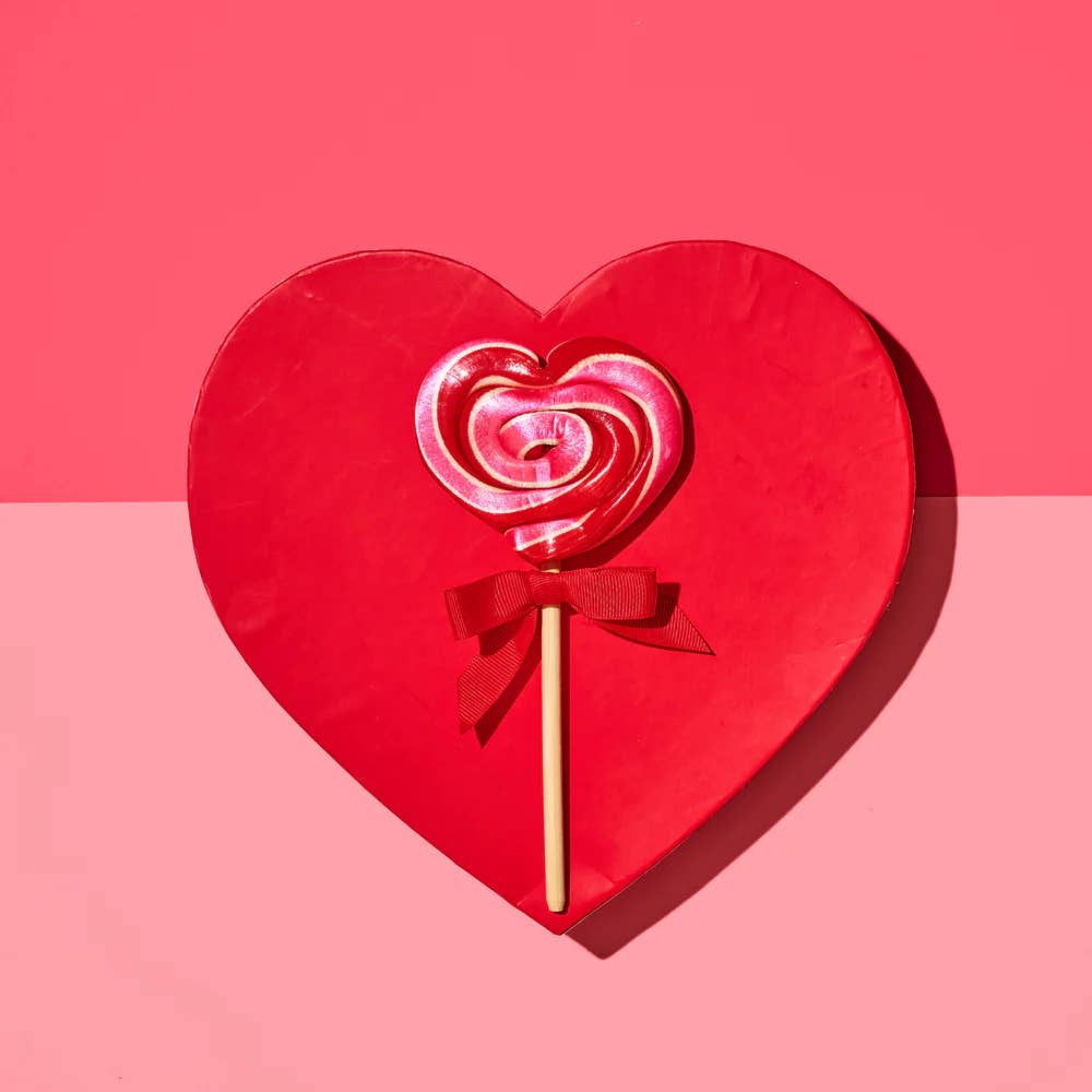 Hammond’s Heart-Shaped Cherry Lollipop brings classic cherry flavor to a playful new format, delivering bold, juicy sweetness with every bite. The heart shape adds instant charm for Valentine’s Day and gives a romantic, whimsical and nostalgic feel. Handmade with care in Denver, Colorado, Hammond’s lollipops are individually pulled, twisted, and packaged by hand using traditional techniques. Crafted on real wooden sticks and offered in an array of vivid colors and inventive flavors.