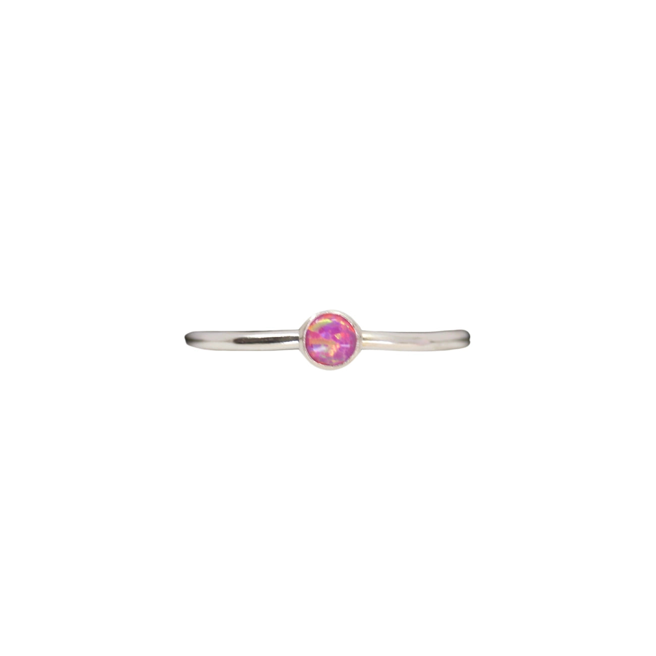 This ring is hand-formed in sterling silver and set with a cultured Cherry Pink opal. Perfect for mixing into a stack or standing out on it's own!
4mm cherry pink opal
Polished finish