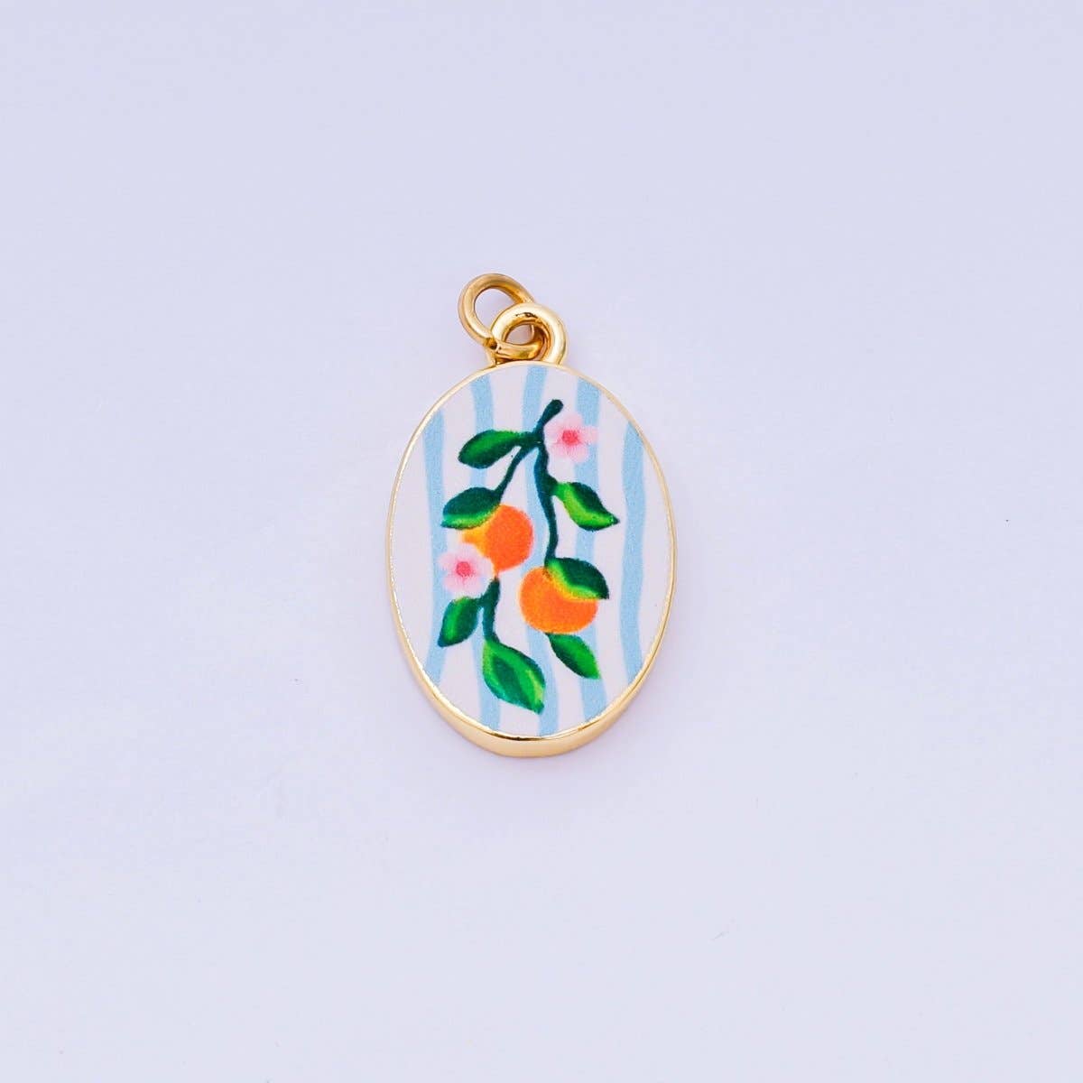 Brighten your jewelry collection with this vibrant Enamel Spring Collection Charm, featuring a warm orange enamel design on the front. Crafted from brass and 24K gold-filled materials with beautiful hand-painted enamel detailing, this petite charm measures 23.1mm x 14.1mm x 3.1mm—the perfect size for bracelets, necklaces, or charm collections. Lead-free and nickel-free, it's safe for sensitive skin and designed to last.