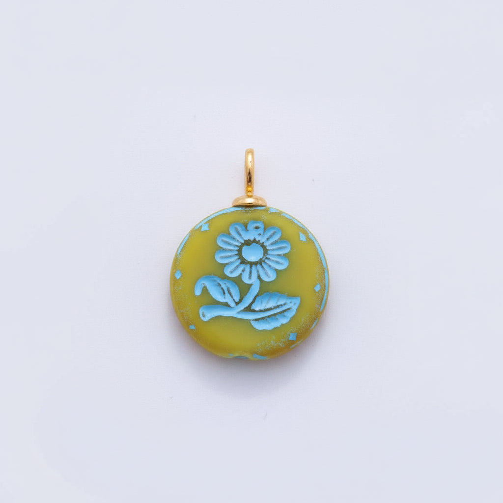 Brighten your jewelry collection with this delicate orange flower charm. Crafted from brass and 24K gold-filled materials, this petite piece features vibrant enamel detailing that captures the warmth of a blooming blossom. Perfect for bracelets, necklaces, or charm collections by Salt & Honey Charmed.