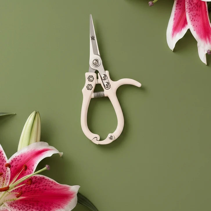 The best way to prune your plants is in style, of course. With an ergonomic handle and a support pillar for extra control, these garden snips are perfect for light pruning, snipping and deadheading. Created by Jungle Club these pruning shears are not only adorable, but also a planting tool you can't live without.
• Dimensions | 6.5” x 3”
• Shear Length | 2.4”
• Cutting Capacity | 6mm
• Materials | High Carbon SK-5 Steel, Hard Chrome Plated, Aluminum Handle
• Imported