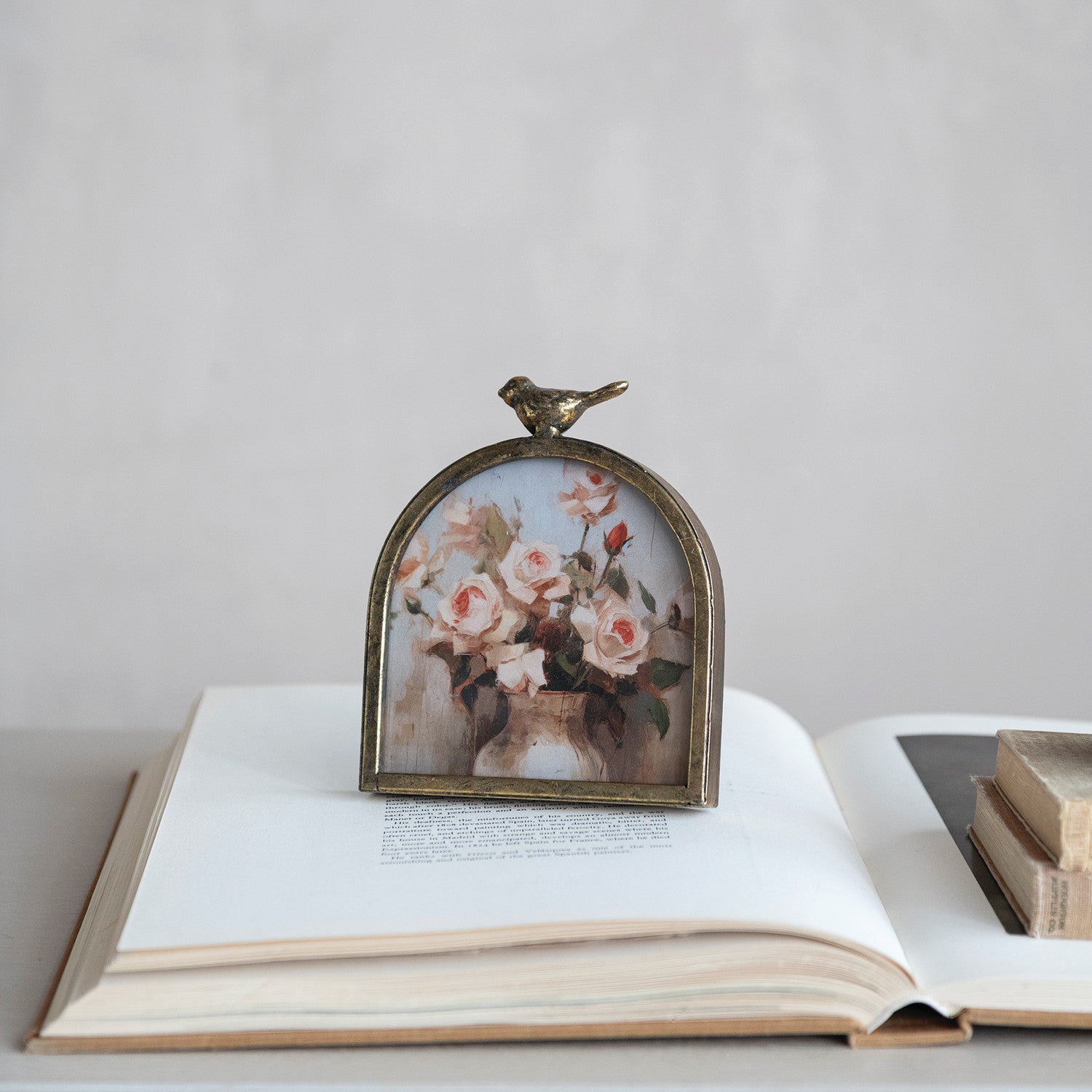 Elevate your cherished memories with this Gold Metal Picture Frame, beautifully crafted for both function and style. The sleek gold-tone metal frame brings a touch of modern luxury, while the glass front keeps your photos protected and on display. Measuring 5.25 inches in length, 3.38 inches in width, and 6.13 inches in height, its compact size is perfect for accenting mantels, shelves, or desks. Make every photo a work of art in a frame that perfectly blends timeless elegance with contemporary warmth.