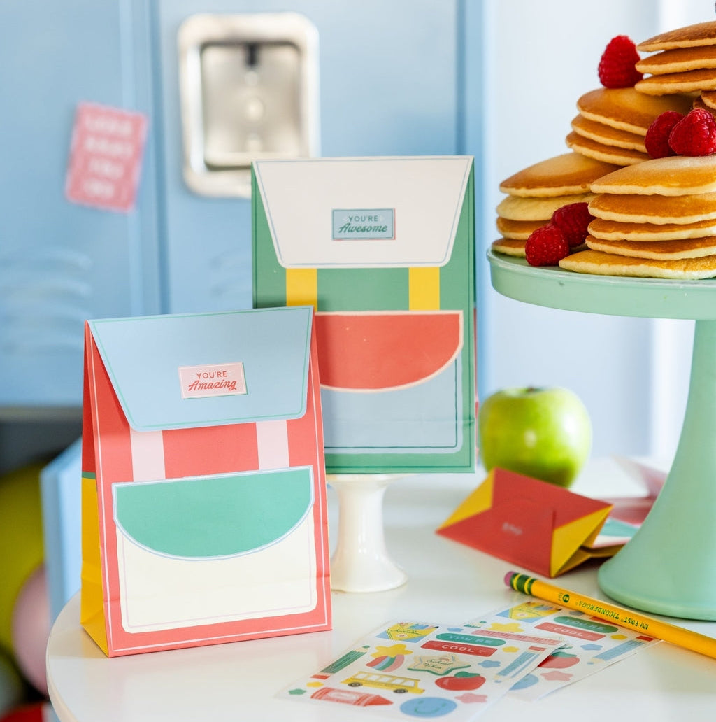 Make back to school extra special with our Back to School Lunchbox Notes from the Homeroom collection! This adorable set of boxed cards features 60 unique designs and messages—perfect for brightening your child’s day. Each double-sided card has a cheerful front and blue grid lines on the back for personal notes. Tucked inside a backpack-shaped box, these lunchbox notes are a parent’s secret to sending smiles and encouragement all school year long.
