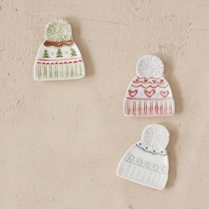 Festive stoneware plate shaped like a cozy Christmas sweater—a whimsical addition to holiday table settings. Perfect for serving appetizers, treats, or displaying seasonal décor. Available in 3 charming styles to match your holiday aesthetic.