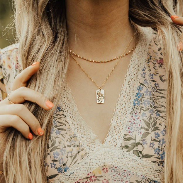 The Amelia Gold Filled Twist Necklace is the perfect piece to stack with other necklaces or wear as a stand alone accessory. She’s 18k gold filled, tarnish and wear resistant, and made to last. Hypoallergenic and nickel free, this unique and dainty 3mm chain is the perfect accessory all year long. 16" length.