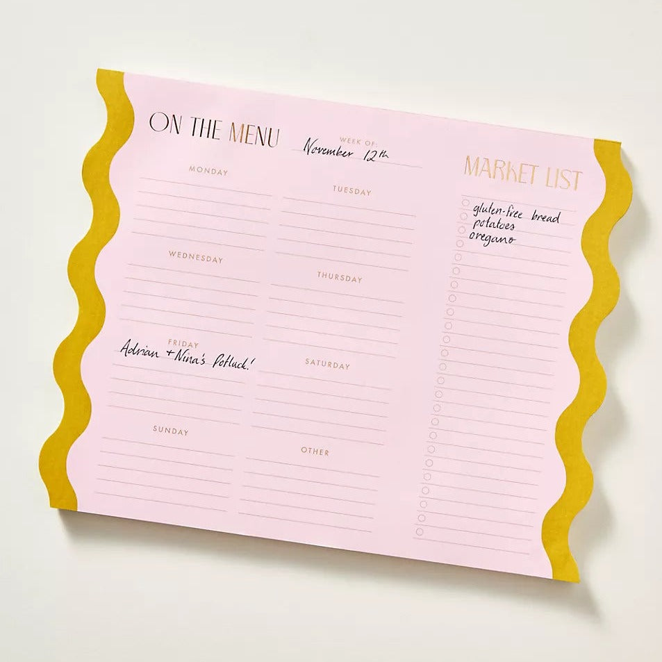 This mod notepad puts the "fun" in functional, with fresh colors, scalloped borders, and designated sections for weekly "on the menu" and "market list" items. This 60-page notepad is designed with mounted magnets on the back for easy hanging, ideal for fridge display.