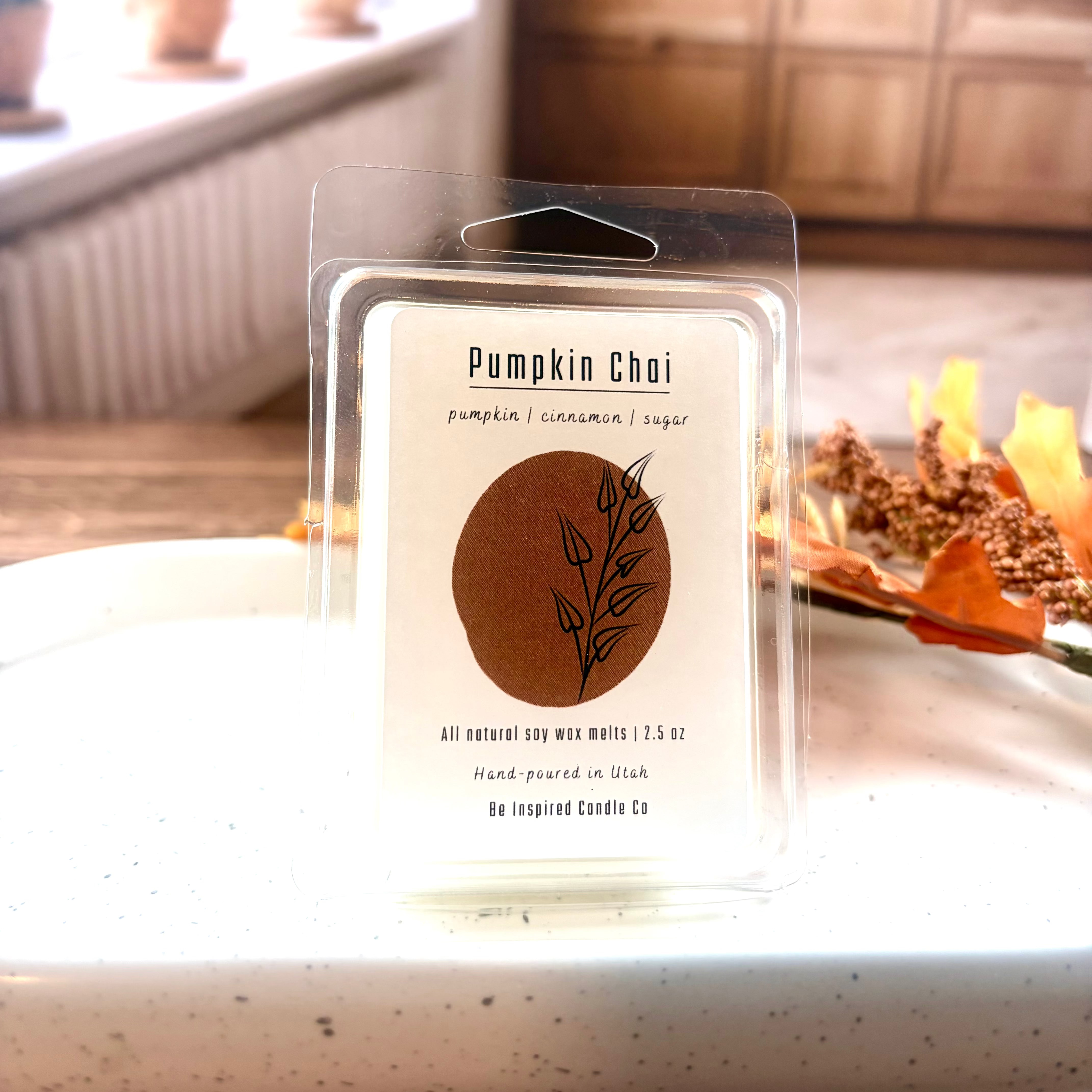 White wax melts in a clear plastic carton with a white label.