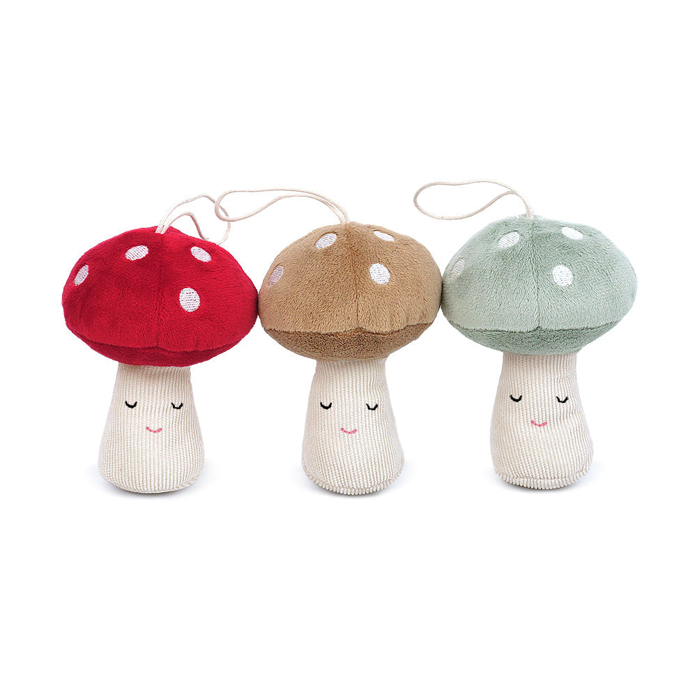 Bring a whimsical touch to your tree with Mon Ami’s Woodland Mushroom Trio. Packaged as a set of three, these unique Christmas plush ornaments in different earth tones feature adorable embroidered faces. A sturdy thread makes these Christmas plush ornaments easy to hang on any tree or any room as a decorative element during the holidays. Our Woodland Mushroom Christmas plush ornaments also make fantastic gift toppers. Red, Tan & Blue