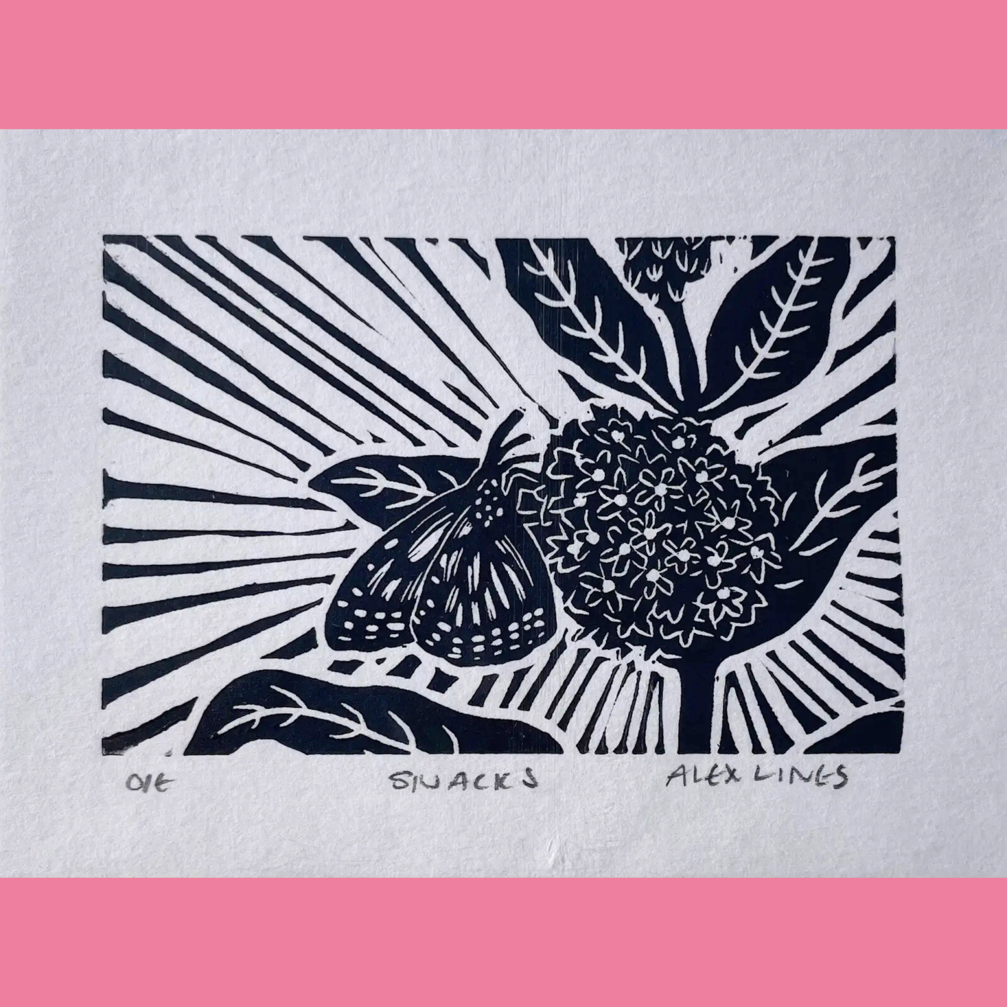 A black-and-white linocut print shows a large fig split open next to a dense cluster of small flowers on a stem, with radiating sunburst lines behind them and surrounding broad leaves and branches creating a vibrant, organic composition. The artwork is printed on white paper with the title "SNACKS," the number "016," and the signature "ALEX LINES" written below, framed by a bright pink border.
