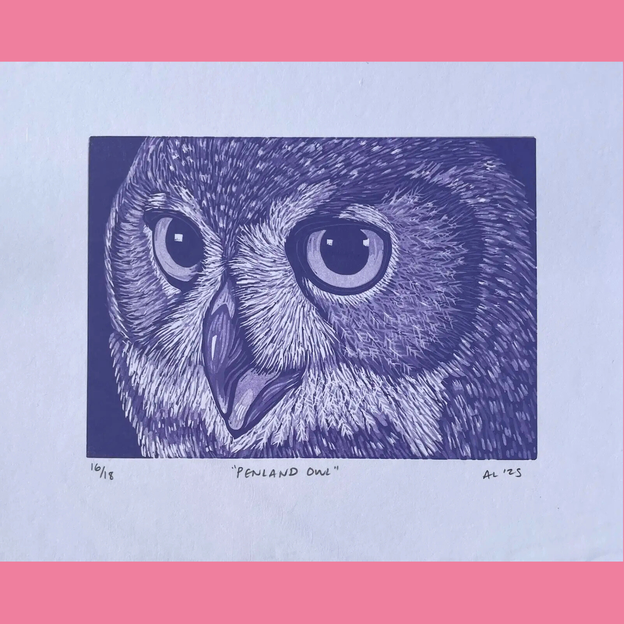 A detailed blue linocut print features a close-up portrait of an owl's face staring directly forward, with large round eyes, a sharp beak, and intricate feather textures created through fine white line work against a solid dark blue background. The artwork is printed on white paper with the edition number "16/18," the title ""PENLAND OWL"", and the signature "AL '25" handwritten below, surrounded by a bright pink border.