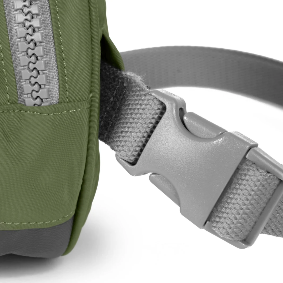 With a front zip pocket, a secret pocket inside, and plenty of space for your keys, sunglasses, and mobile phone this little hip bag is going to change your life in a big way! With an adjustable waist strap and sturdy zips, this little treasure is made with weather-resistant, recycled nylon material.