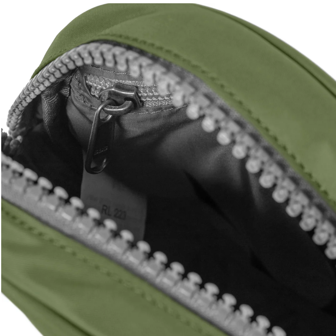 With a front zip pocket, a secret pocket inside, and plenty of space for your keys, sunglasses, and mobile phone this little hip bag is going to change your life in a big way! With an adjustable waist strap and sturdy zips, this little treasure is made with weather-resistant, recycled nylon material.