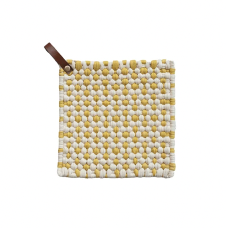 This yellow and white square cotton crocheted pot holder with a leather loop is a cozy and rustic addition to the home or office kitchen. It features a square shape and a cotton crocheted design providing protection from hot pots and pans. The holder's leather loop allows easy storage and access.