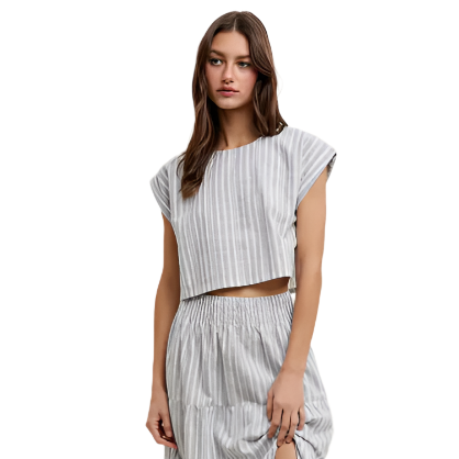 Get ready to rock that laid-back look with this Striped Relaxed Crop Top! With its fun and playful stripes, this top will add the perfect amount of quirkiness to your outfit. Made with a relaxed fit, it's both comfortable and stylish.