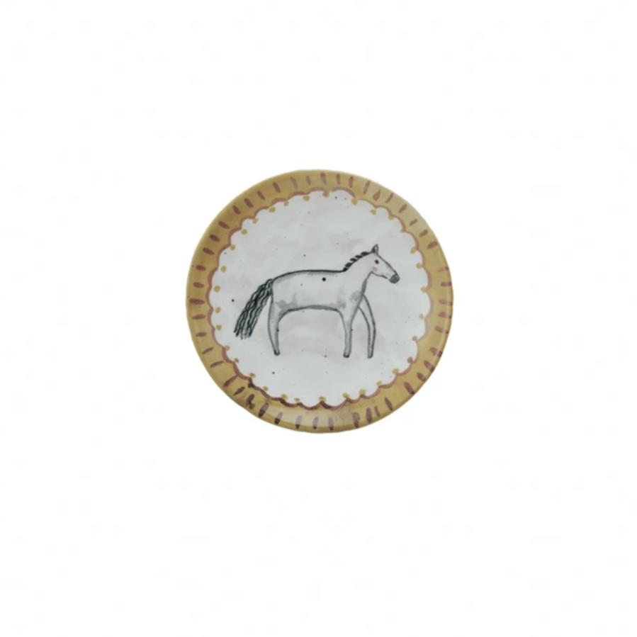 Round plate with horse design on a white background