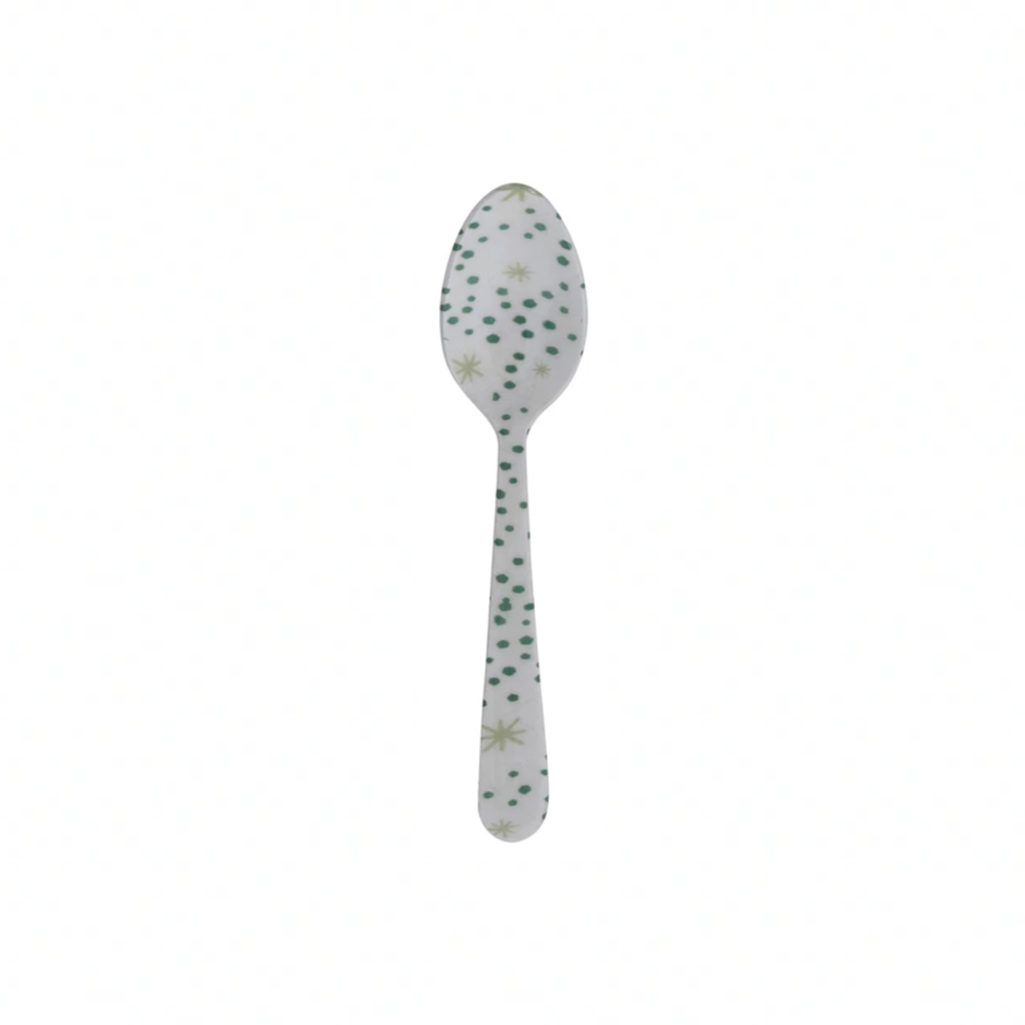 Spoon with floral pattern on a white background