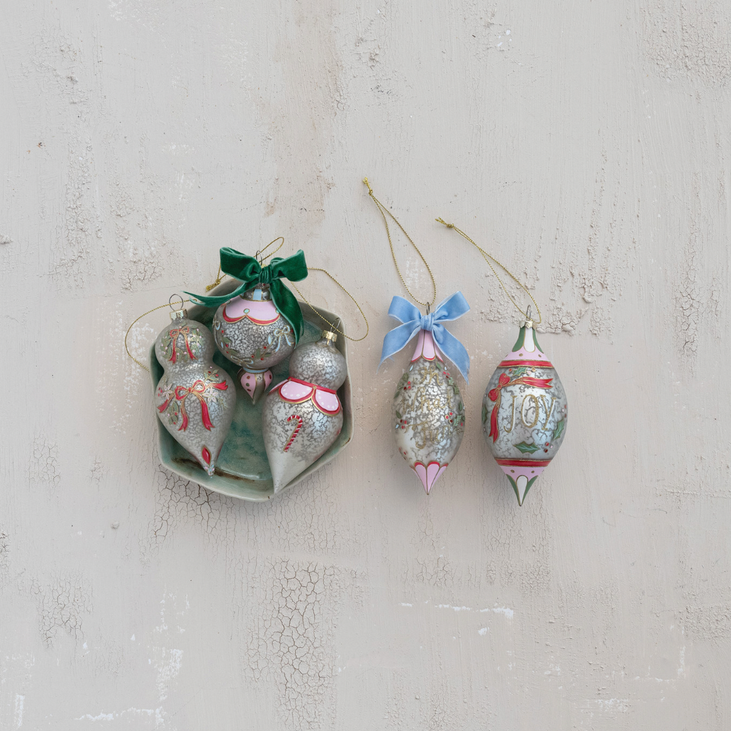 Decorative Christmas ornaments on a textured surface