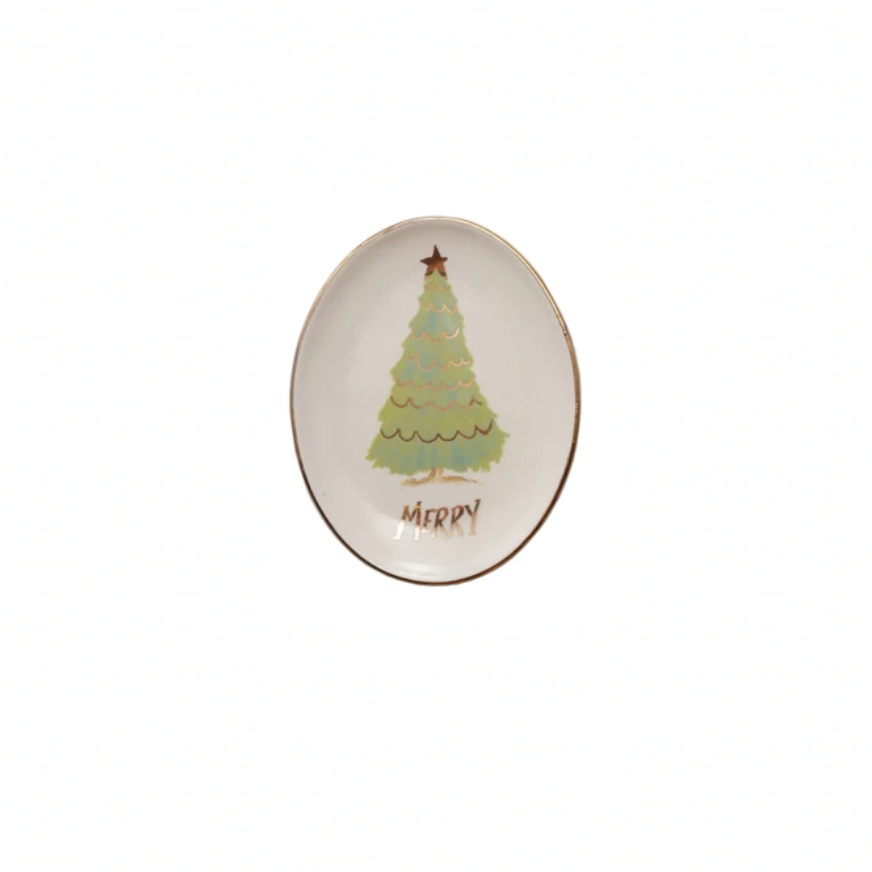 Decorative oval plate with a Christmas tree design and 'Merry' text on a white background