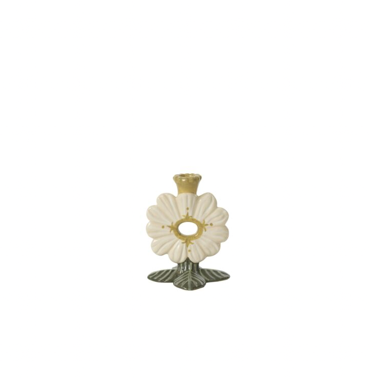 Decorative candle holder with floral design on a white background