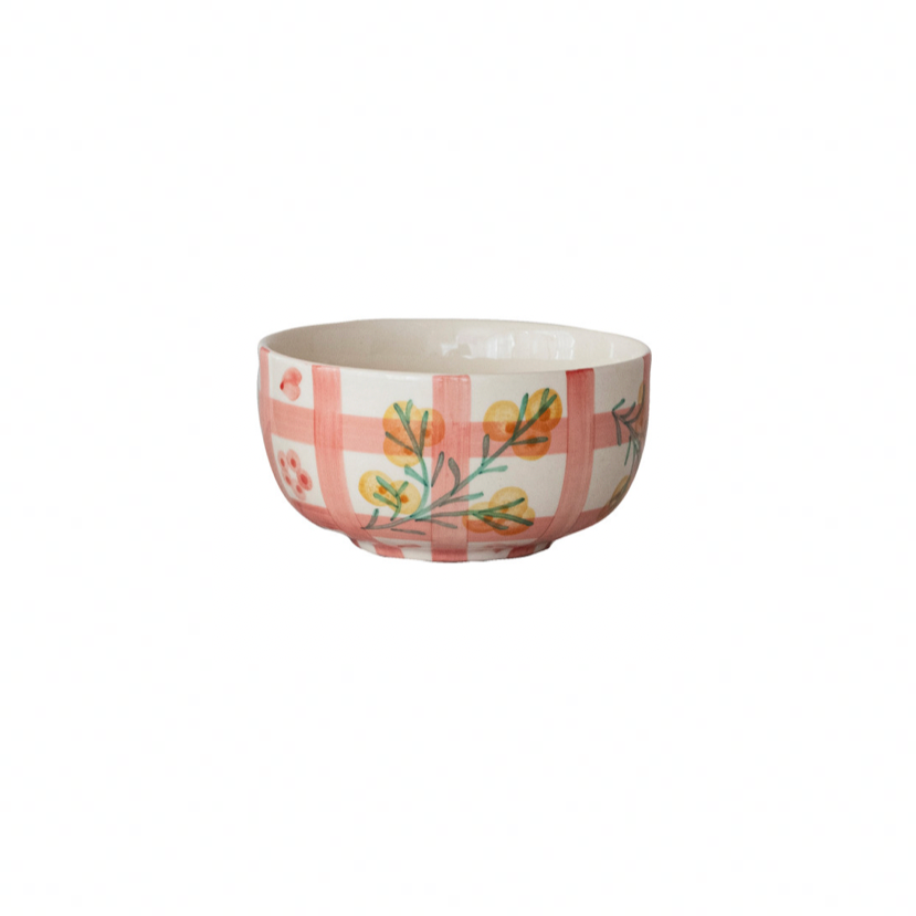 Decorative bowl with floral pattern on a white background
