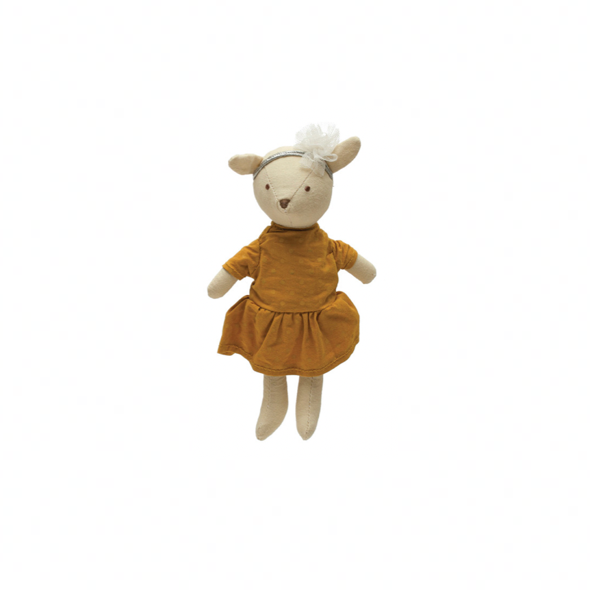 Stuffed animal toy with a yellow dress on a white background