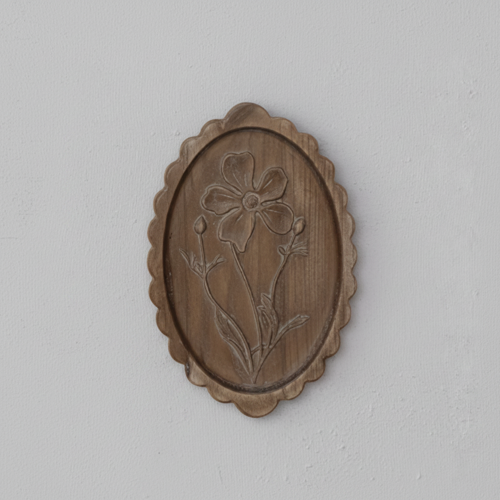 Set of framed artwork on a light gray wall