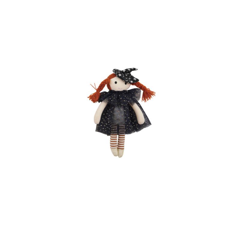 A small doll with red yarn hair, wearing a black dress and witch hat, standing on a white background.