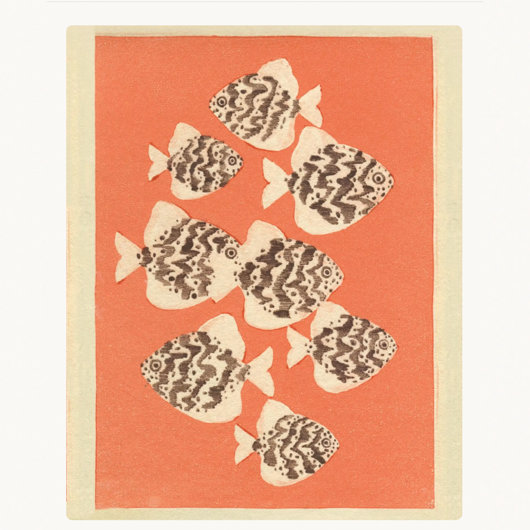 Art print featuring a school of fish swimming on a coral-orange background, framed by a cream border. The fish are patterned with dark brown and cream wavy stripes.