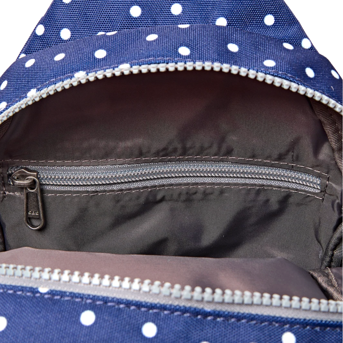 Willesden Sling Bag in Navy Polka Dot
