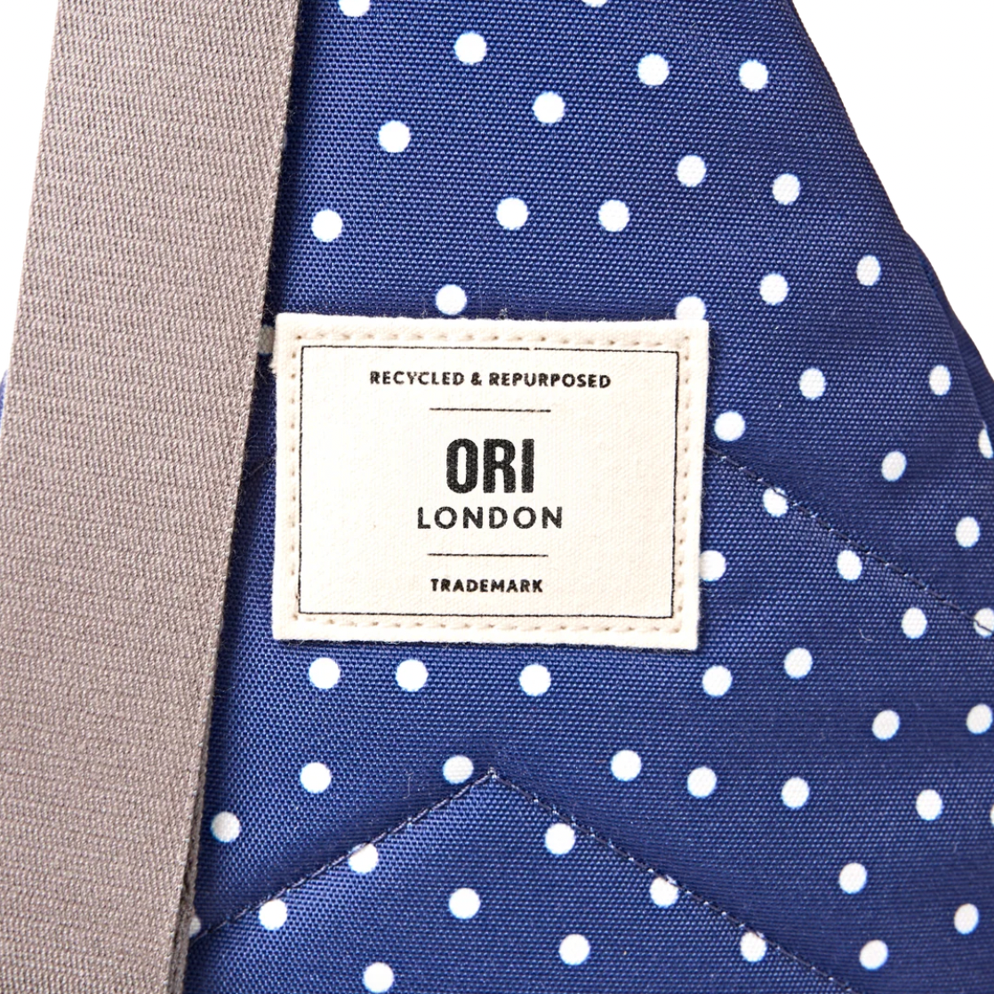 Willesden Sling Bag in Navy Polka Dot