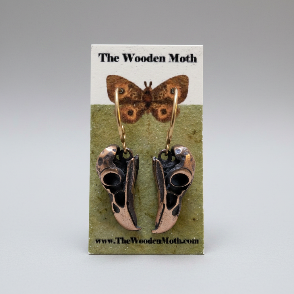 The Wooden Moth Brass Earrings Raven Skulls Bronze