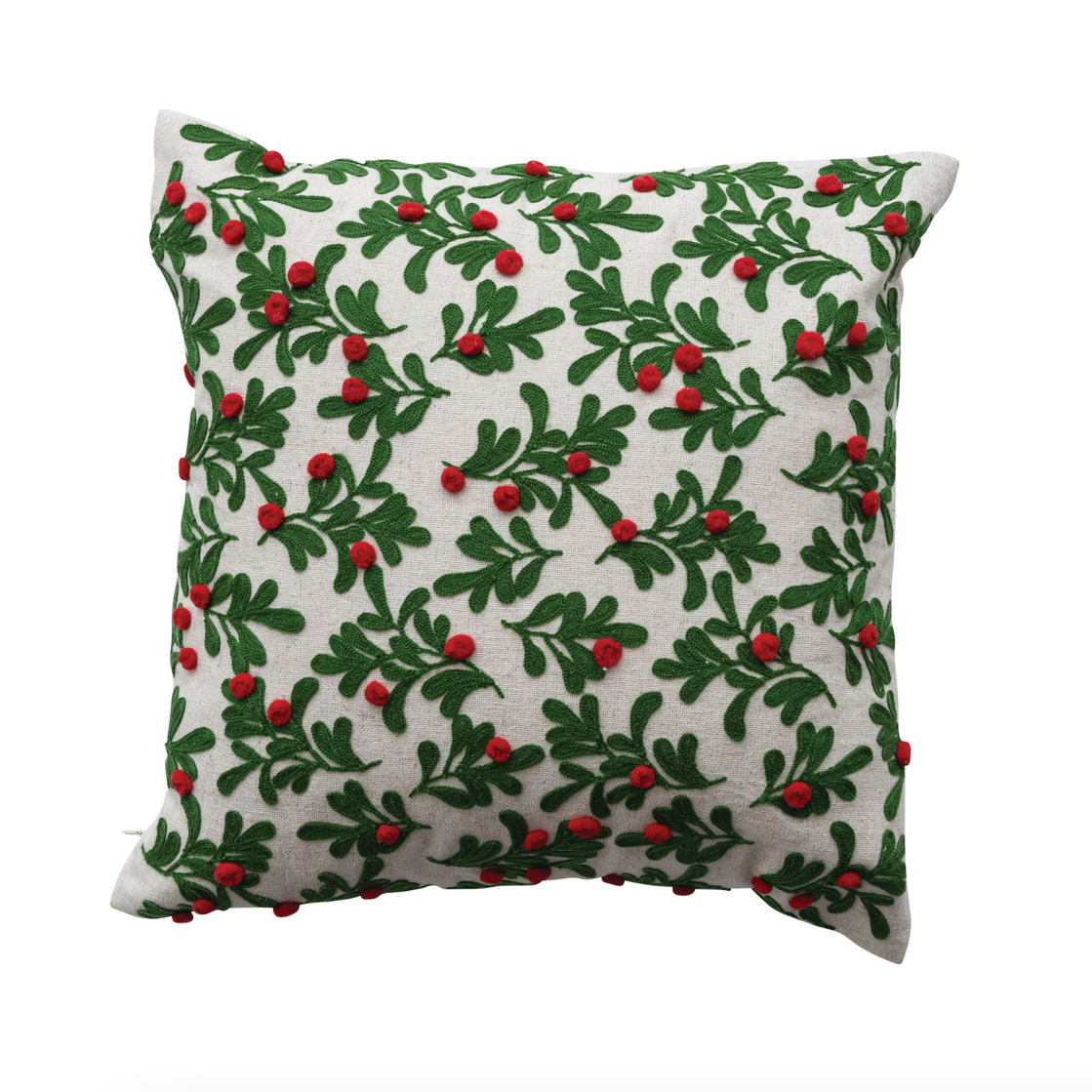 A square decorative throw pillow featuring a green mistletoe and holly leaf pattern with small red berries on an off-white background, isolated on a white studio background.