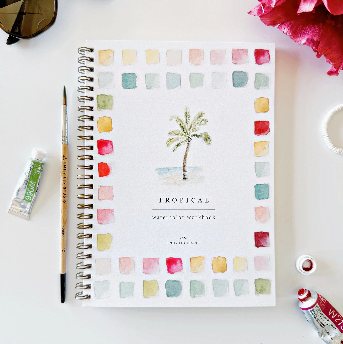 A watercolor book of Tropical scenes.