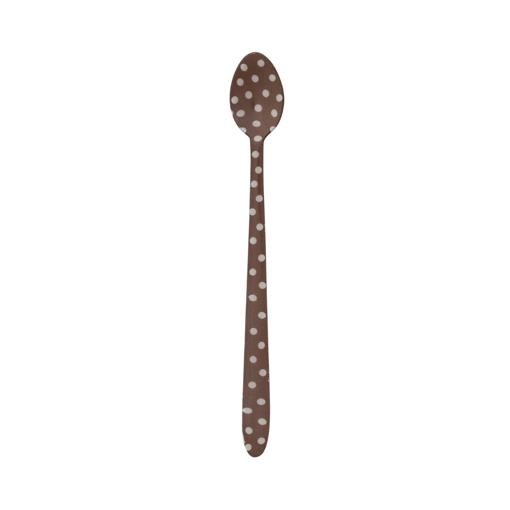 brown with white dots cocktail spoon on a white background