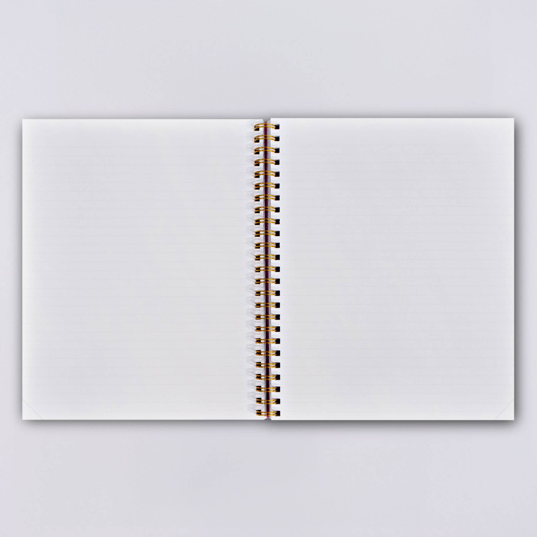 This lovely soft cover notebook is made in the UK using FSC certified paper. It measures 17.8 x 21.5cms, which is just slightly bigger than an A5 size and has brass colored wire binding. It has 160 lined pages, made from 115gsm recycled paper and features a 300gsm soft cover.