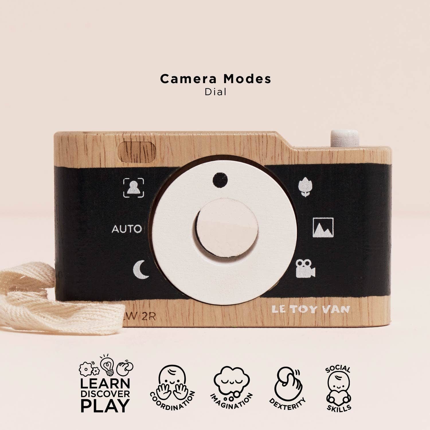 Wooden toy camera with black dial and 'Le Toy Van' branding on a beige background.