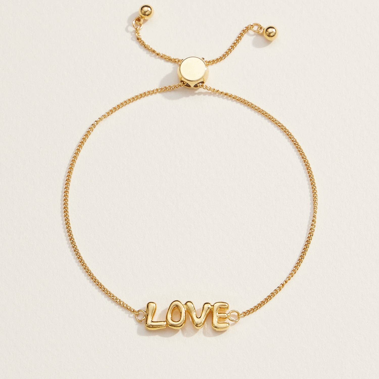 Spread love with our Love Script Adjustable Bracelet, featuring a sleek "LOVE" design in polished gold tones. This lightweight and chic bracelet has an adjustable chain with a sliding clasp, ensuring a perfect fit for any wrist size. Whether worn solo or layered, this bracelet is a versatile accessory for daily wear or special occasions. It's an ideal gift for anniversaries, Valentine's Day, or simply to show someone you care.
Details:
Love Script
Adjustable
18K Gold Dipped Bracelet in Gold
