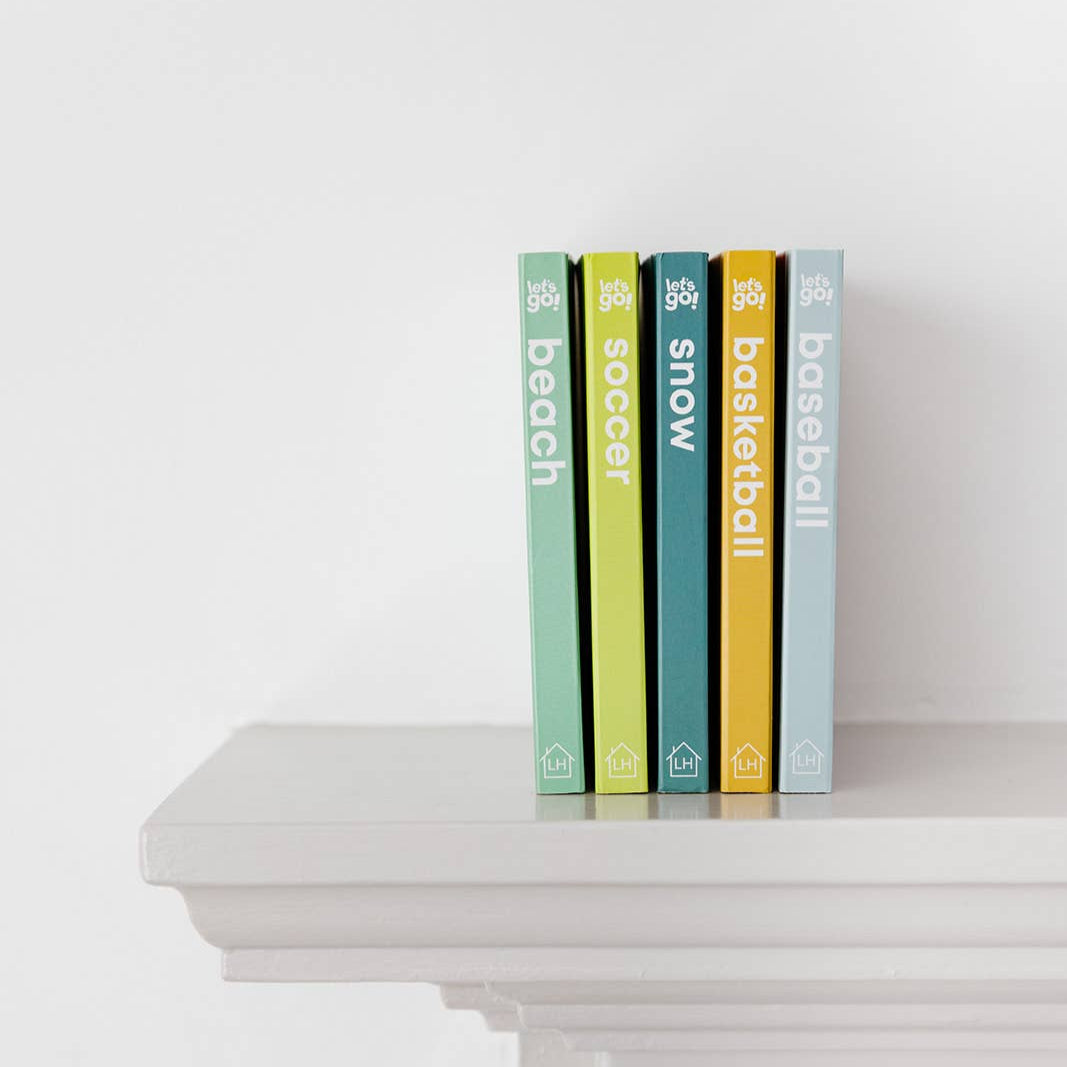Five books with titles on a white surface