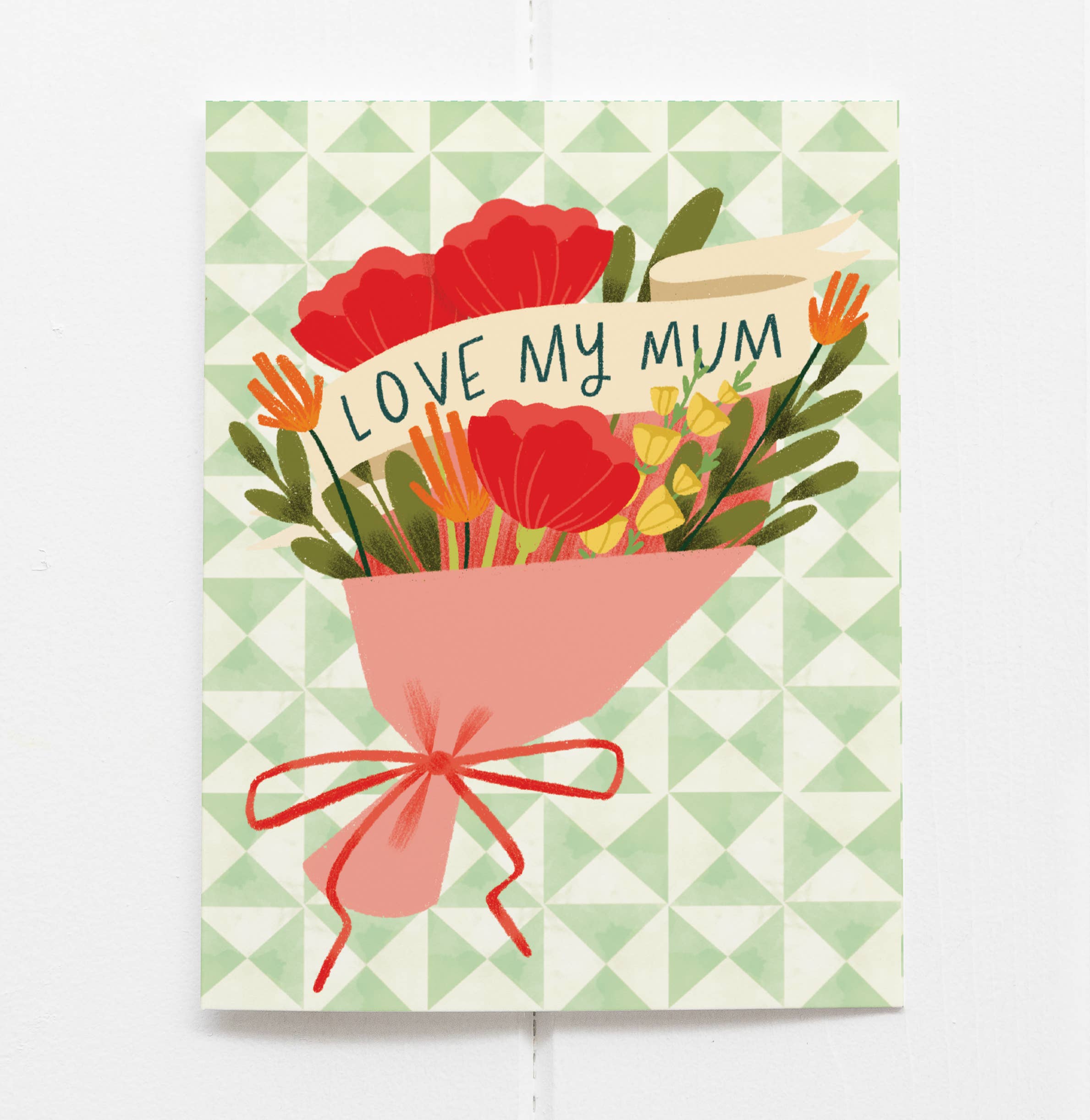 Greeting card with floral design and 'Love My Mum' text on a green geometric patterned background