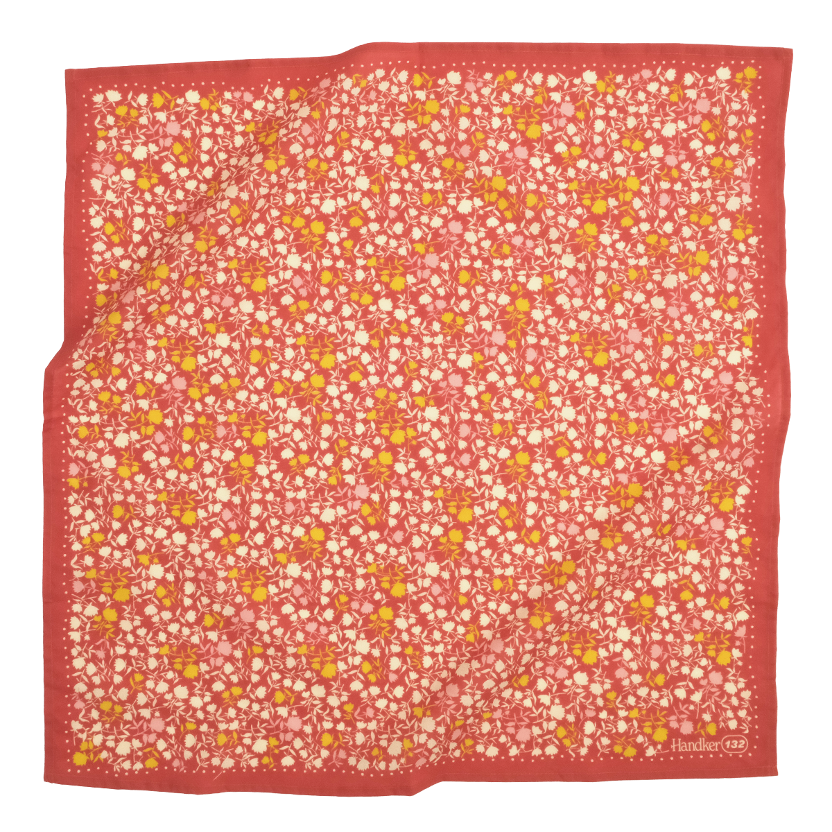 Floral patterned fabric square with a red border on a white background